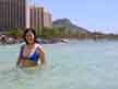 Here's Soo with Diamondhead in the background, which is a mountain formed from a crater.