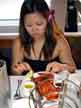 This was the first time we ever had a full lobster.  Here's Soo thinking, 'how the heck do I eat this thing!?' Fortunately, the servers went around helping us crack these suckers open.