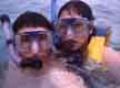 Soo and me decked out in our snorkeling gear... I took this pic with an underwater one-time-use camera, which explains the mediocre picture quality.