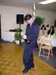 Jay trying to open our bottle of champagne for our toast.  He ended up shaking it and it shot out all over the dance floor.  hehe.